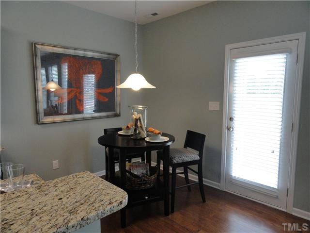 4400 Hargrove Road Raleigh, NC 27604 - Photo 3 of 10 a workspace with furniture window and wooden floor