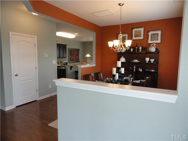4400 Hargrove Road Raleigh, NC 27604 - Photo 4 of 10 a view of a dining room with furniture and chandelier