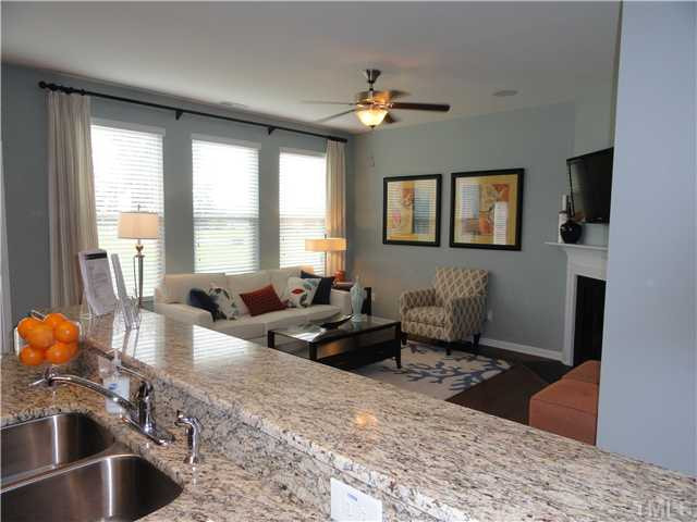 4400 Hargrove Road Raleigh, NC 27604 - Photo 6 of 10 a living room with furniture and a flat screen tv