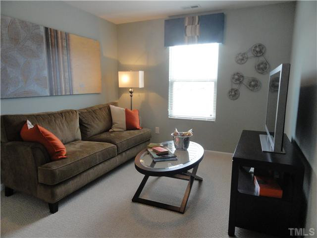 4400 Hargrove Road Raleigh, NC 27604 - Photo 8 of 10 a living room with furniture and a window