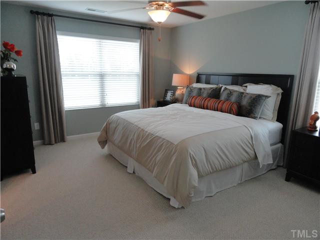 4400 Hargrove Road Raleigh, NC 27604 - Photo 9 of 10 a bedroom with a bed and window