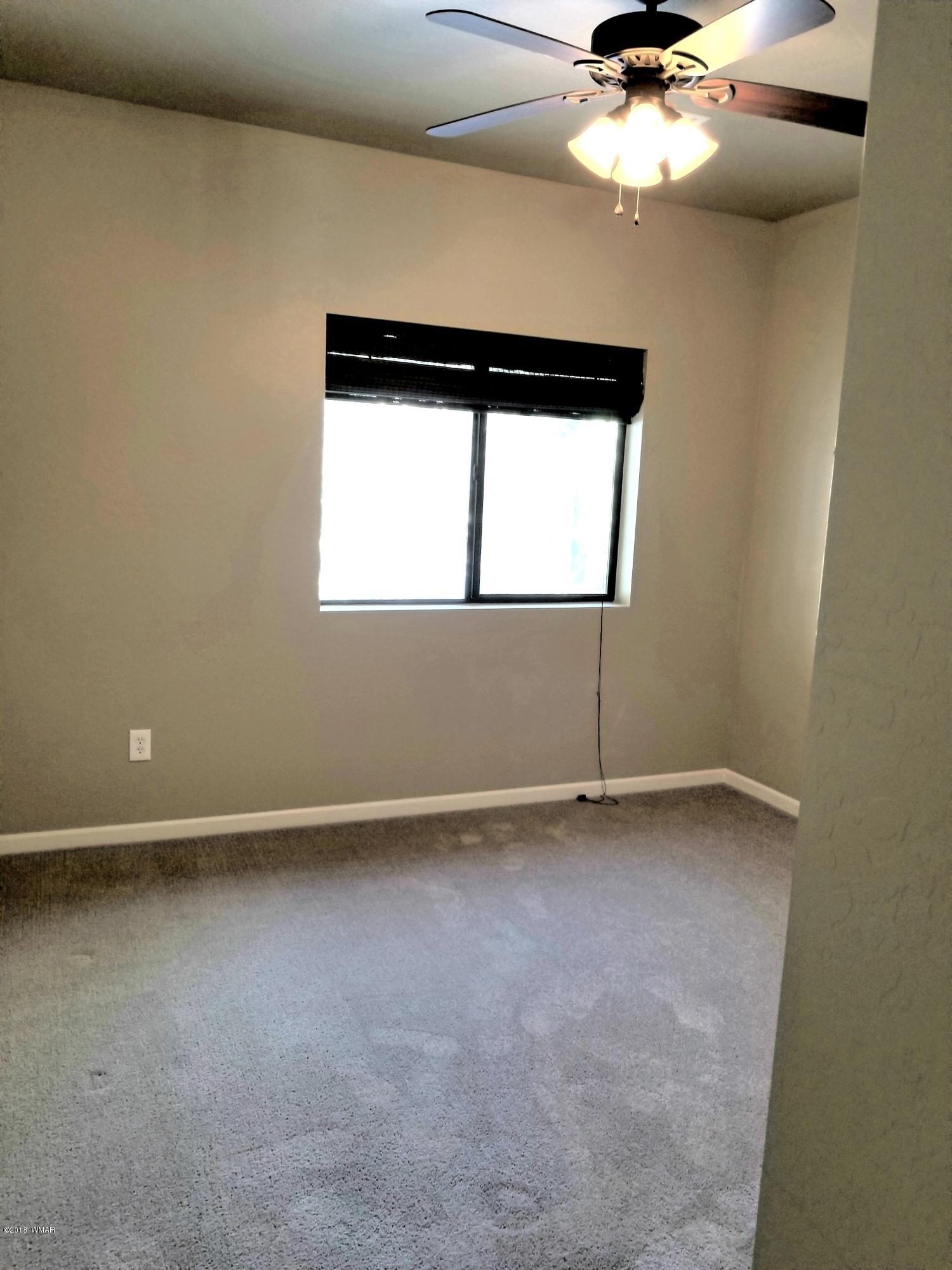 2962 Chestnut Circle, Unit 3 Pinetop, AZ 85935 - Photo 19 of 35 an empty room with a window