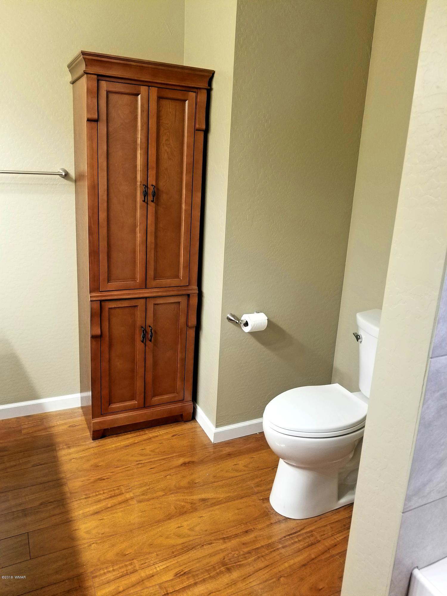 2962 Chestnut Circle, Unit 3 Pinetop, AZ 85935 - Photo 27 of 35 a bathroom view of a toilet and a sink