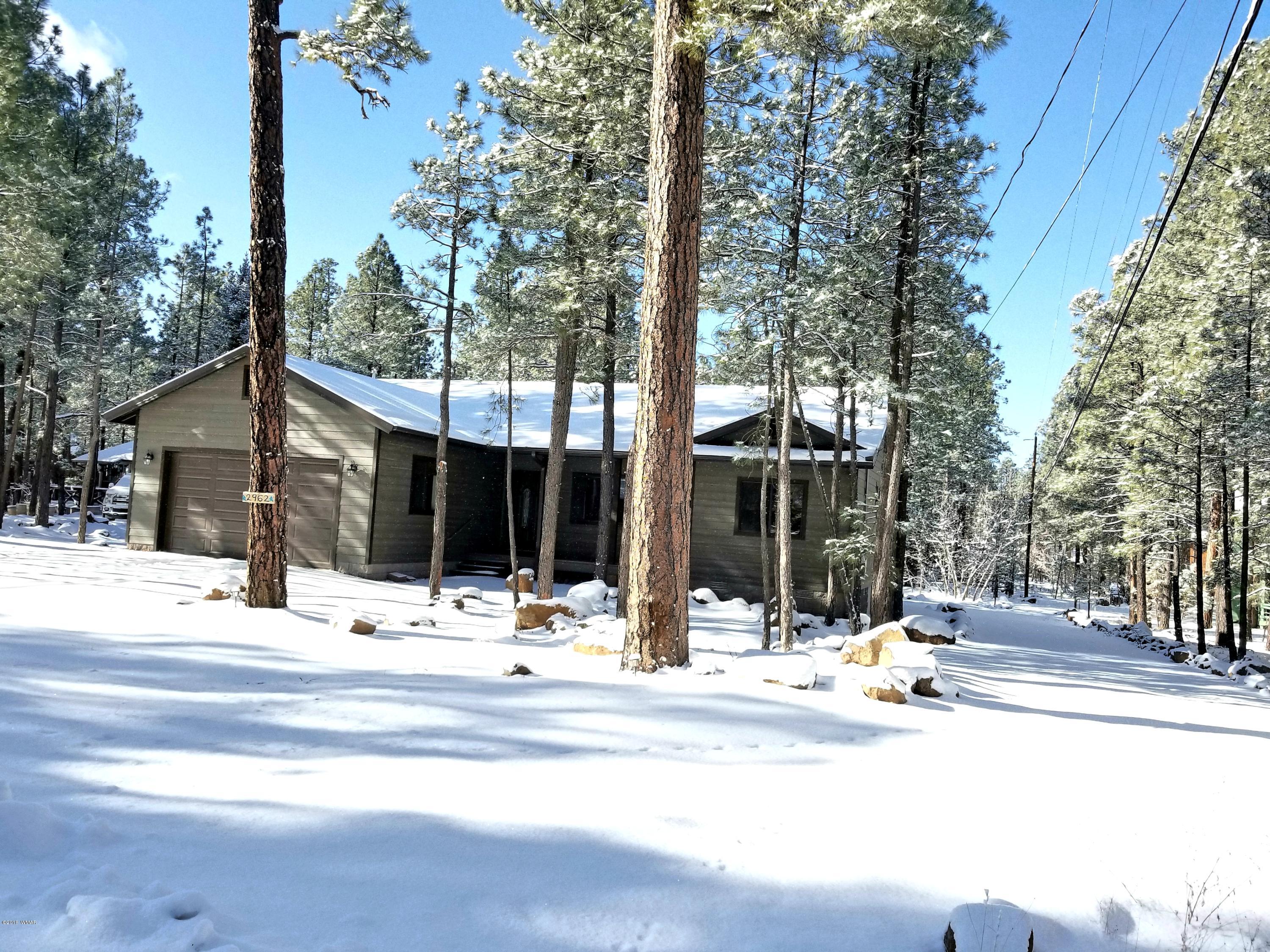 2962 Chestnut Circle, Unit 3 Pinetop, AZ 85935 - Photo 3 of 35 a view of a house with snow on the road