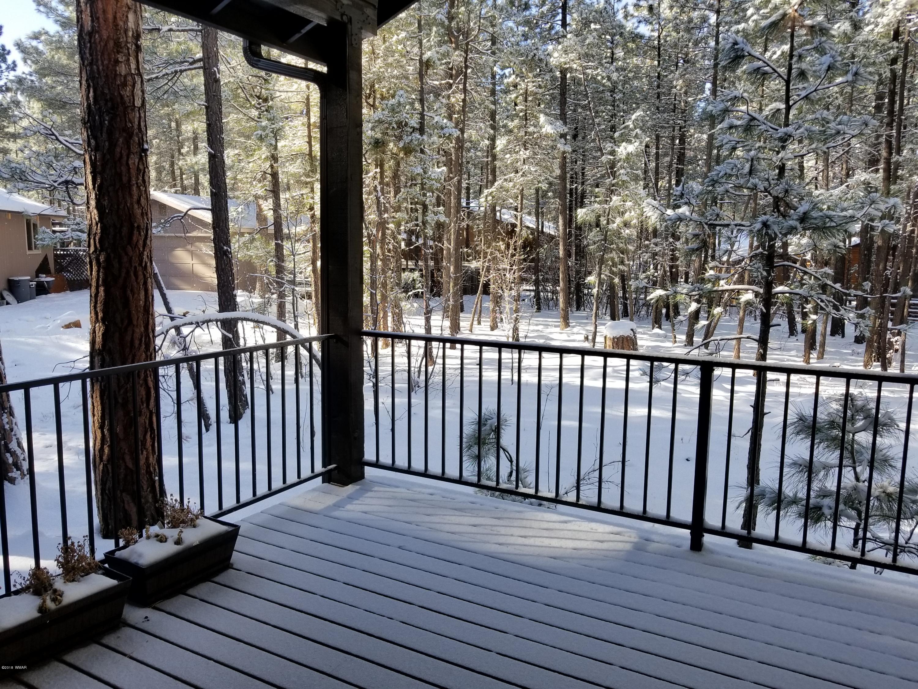 2962 Chestnut Circle, Unit 3 Pinetop, AZ 85935 - Photo 9 of 35 a view of a balcony with wooden floor