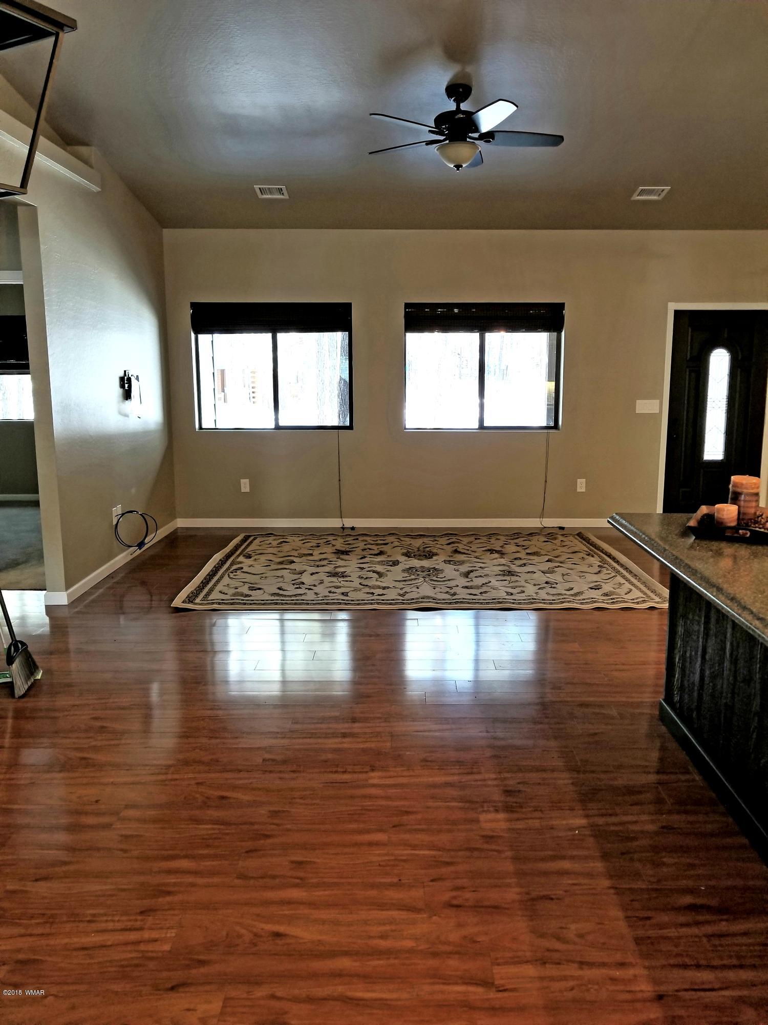 2962 Chestnut Circle, Unit 3 Pinetop, AZ 85935 - Photo 10 of 35 a view of empty room with wooden floor