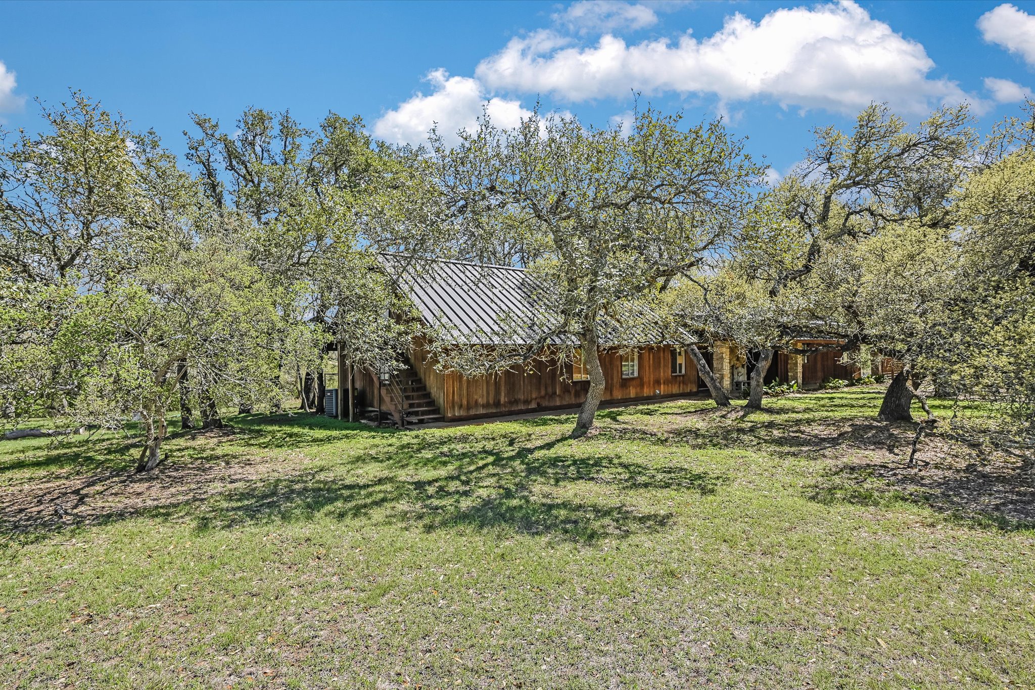 411 Whitetail Ridge Austin, TX 78737 - Photo 2 of 38 View of green lawn