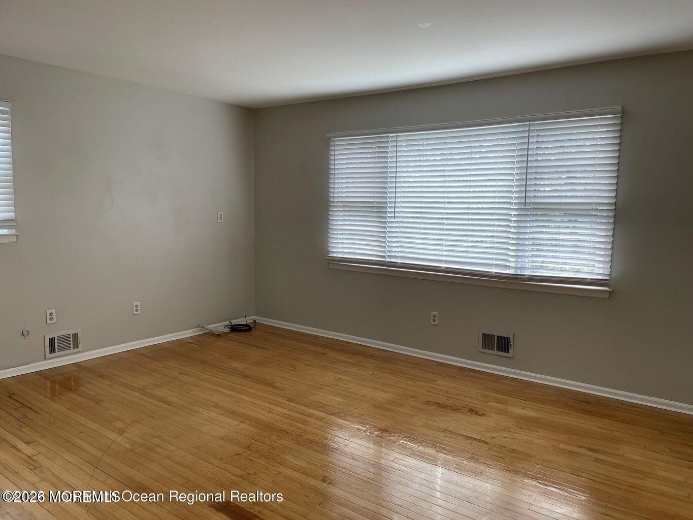 13 Johnson Avenue, Unit 2 Matawan, NJ 07747 - Photo 6 of 10 a view of an empty room with a window