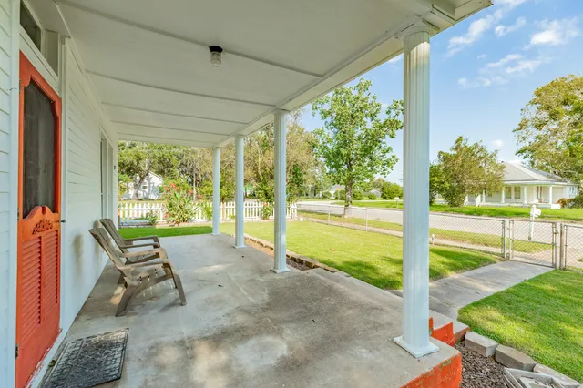a view of swimming pool with a patio