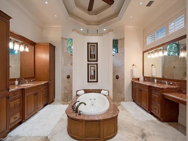 a large kitchen with stainless steel appliances granite countertop a sink and stove