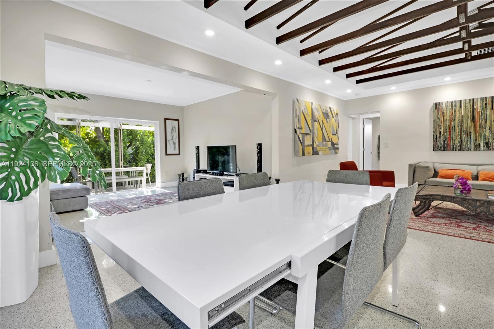 9008 Dickens Avenue Surfside, FL 33154 - Photo 5 of 29 a large white kitchen with a large window