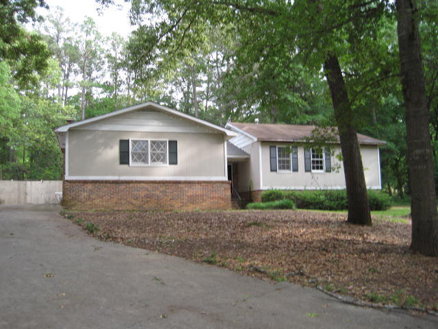 164 Bone Creek Road Macon, GA 31211 - Photo 1 of 1 a front view of a house with a yard