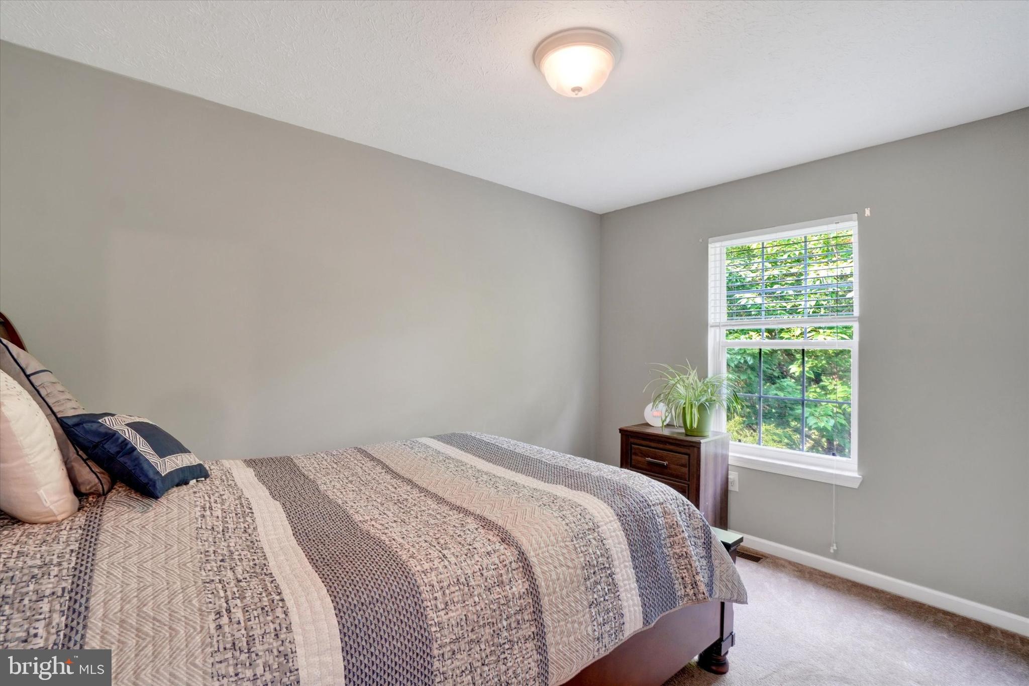 335 Sechrist Flat Road Felton, PA 17322 - Photo 12 of 28 a bedroom with a bed and a window