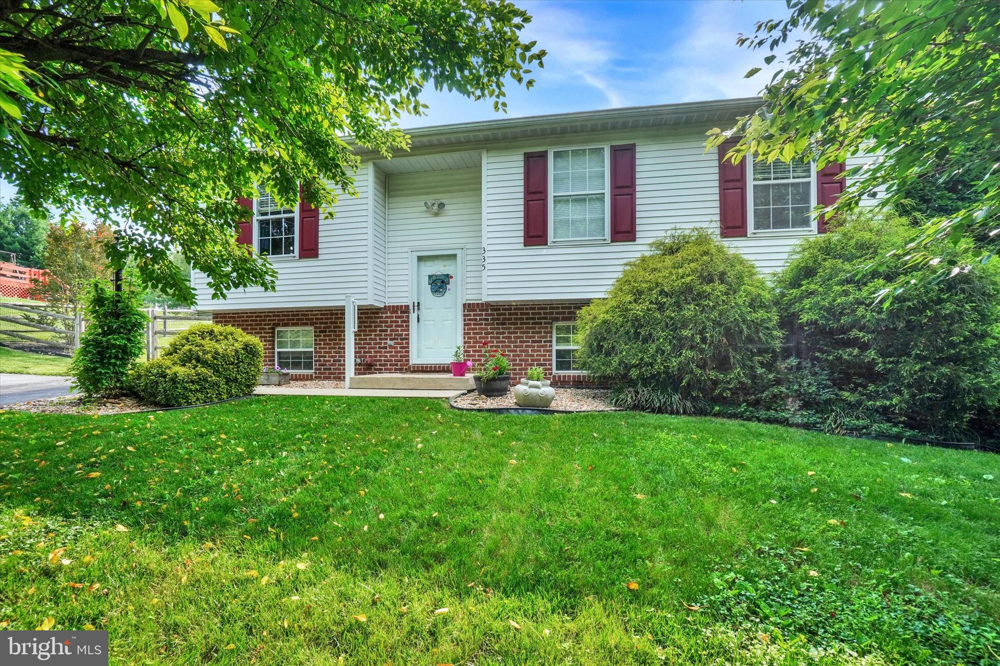 335 Sechrist Flat Road Felton, PA 17322 - Photo 2 of 28 a view of a house with a backyard