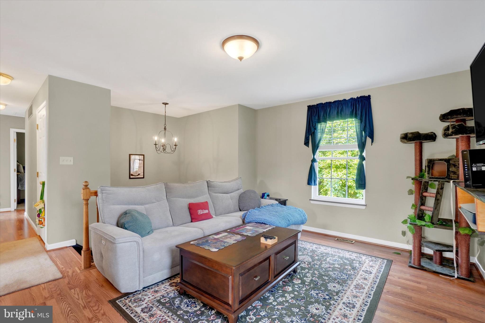 335 Sechrist Flat Road Felton, PA 17322 - Photo 4 of 28 a living room with furniture and a window