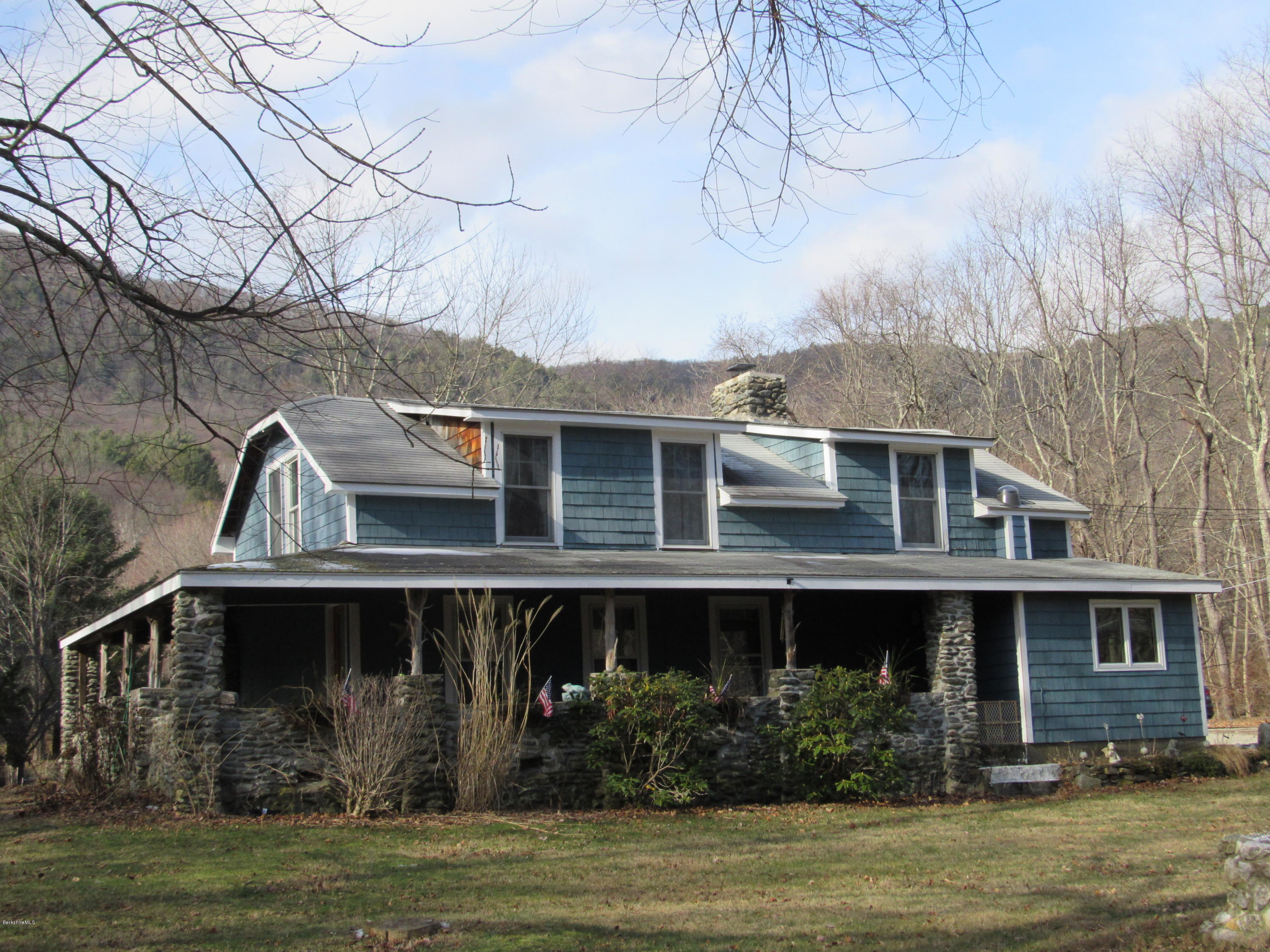 906 South Undermountain Road Sheffield, MA 01257 - Photo 12 of 12 a front view of a house with balcony