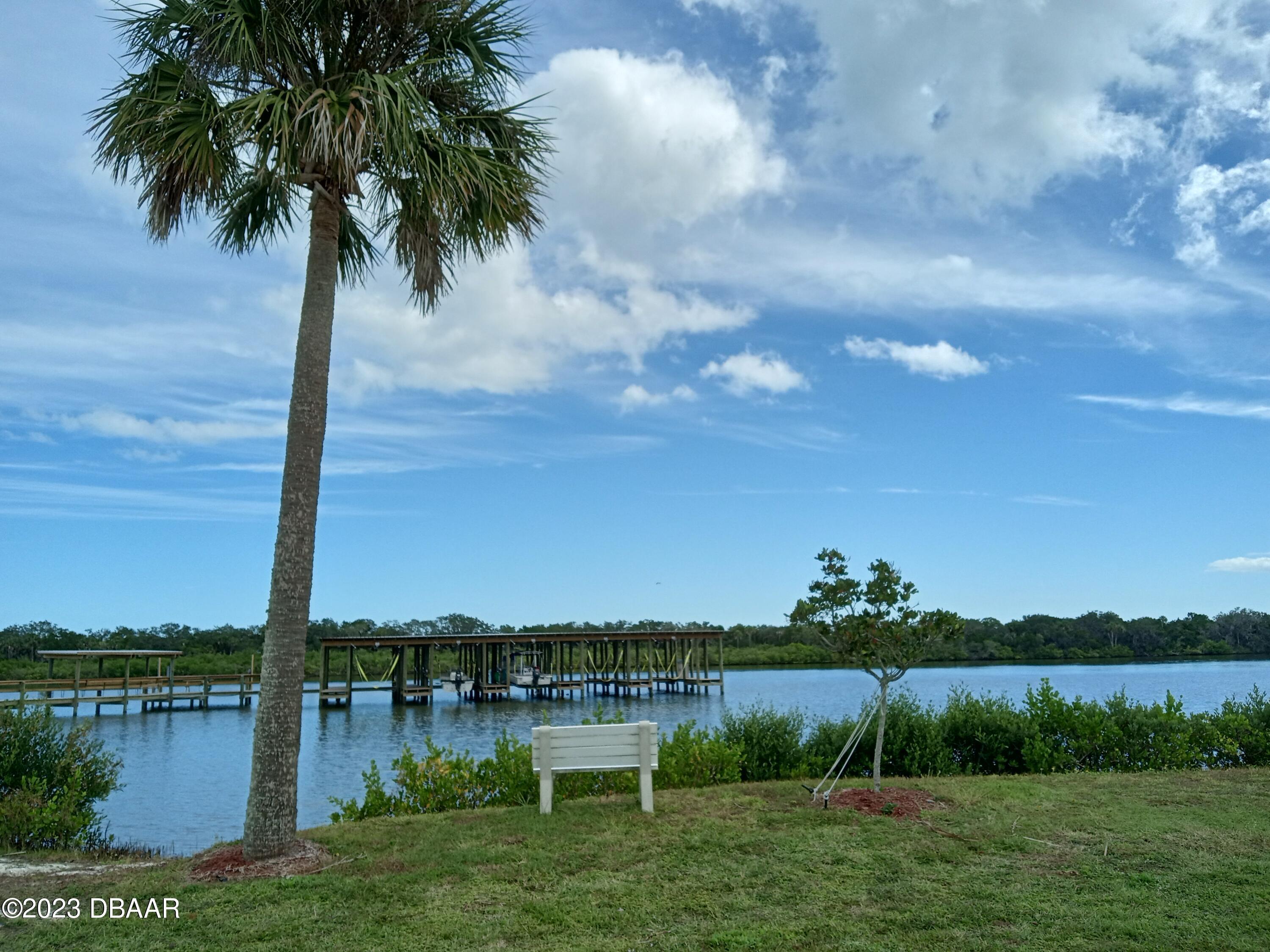 4332 Cedar Way Edgewater, FL 32141 - Photo 11 of 25 a view of a lake view with a lake view