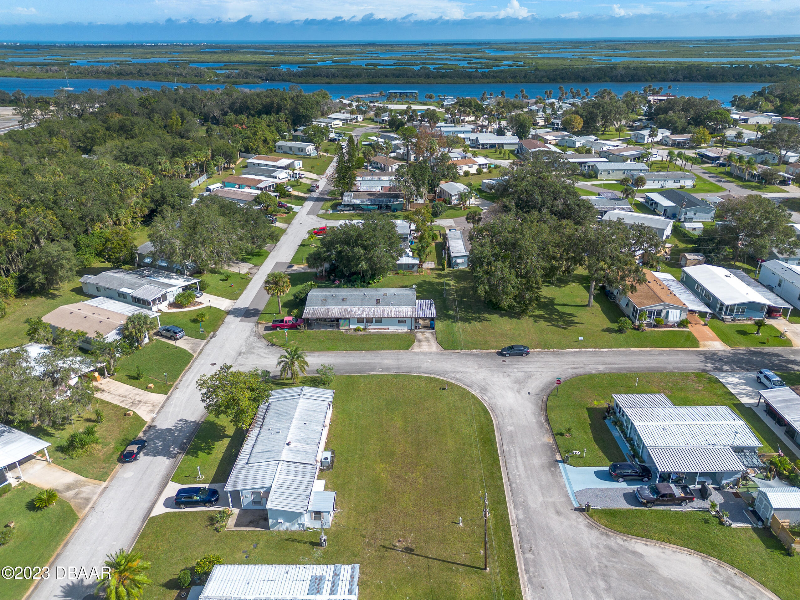 4332 Cedar Way Edgewater, FL 32141 - Photo 19 of 25 a view of a swimming pool and lake view
