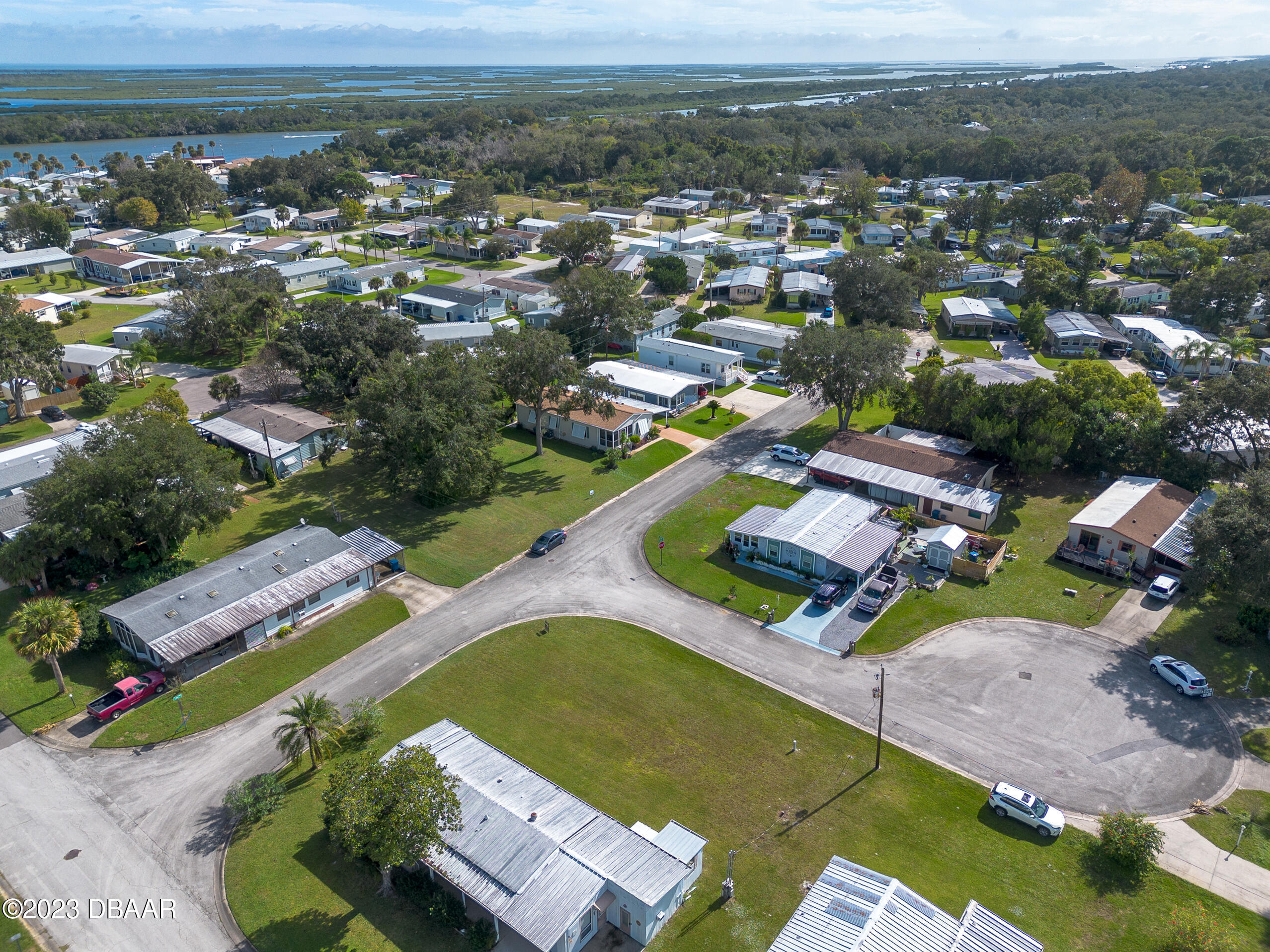 4332 Cedar Way Edgewater, FL 32141 - Photo 20 of 25 an aerial view of a residential houses with outdoor space