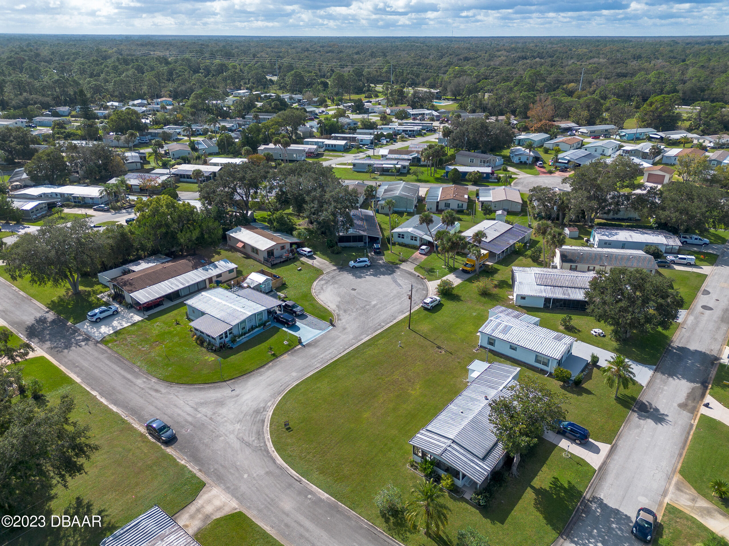 4332 Cedar Way Edgewater, FL 32141 - Photo 22 of 25 an aerial view of a house with a garden