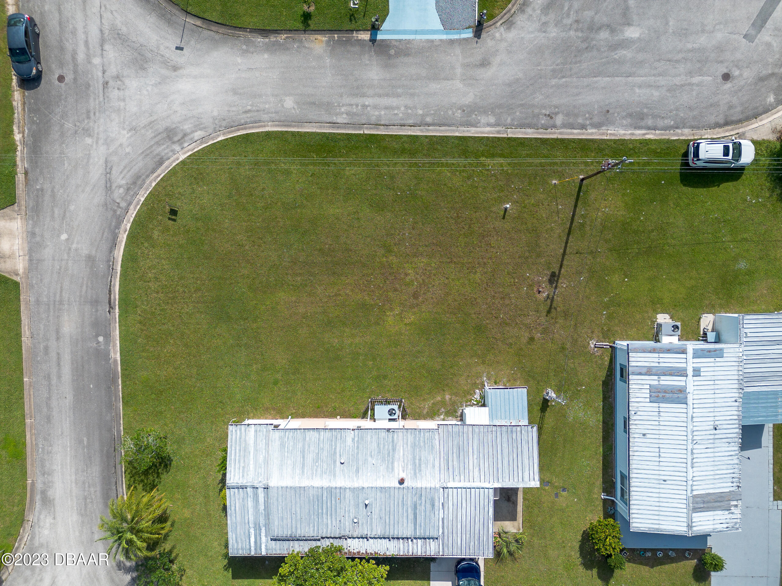 4332 Cedar Way Edgewater, FL 32141 - Photo 25 of 25 an aerial view of a house with a swimming pool