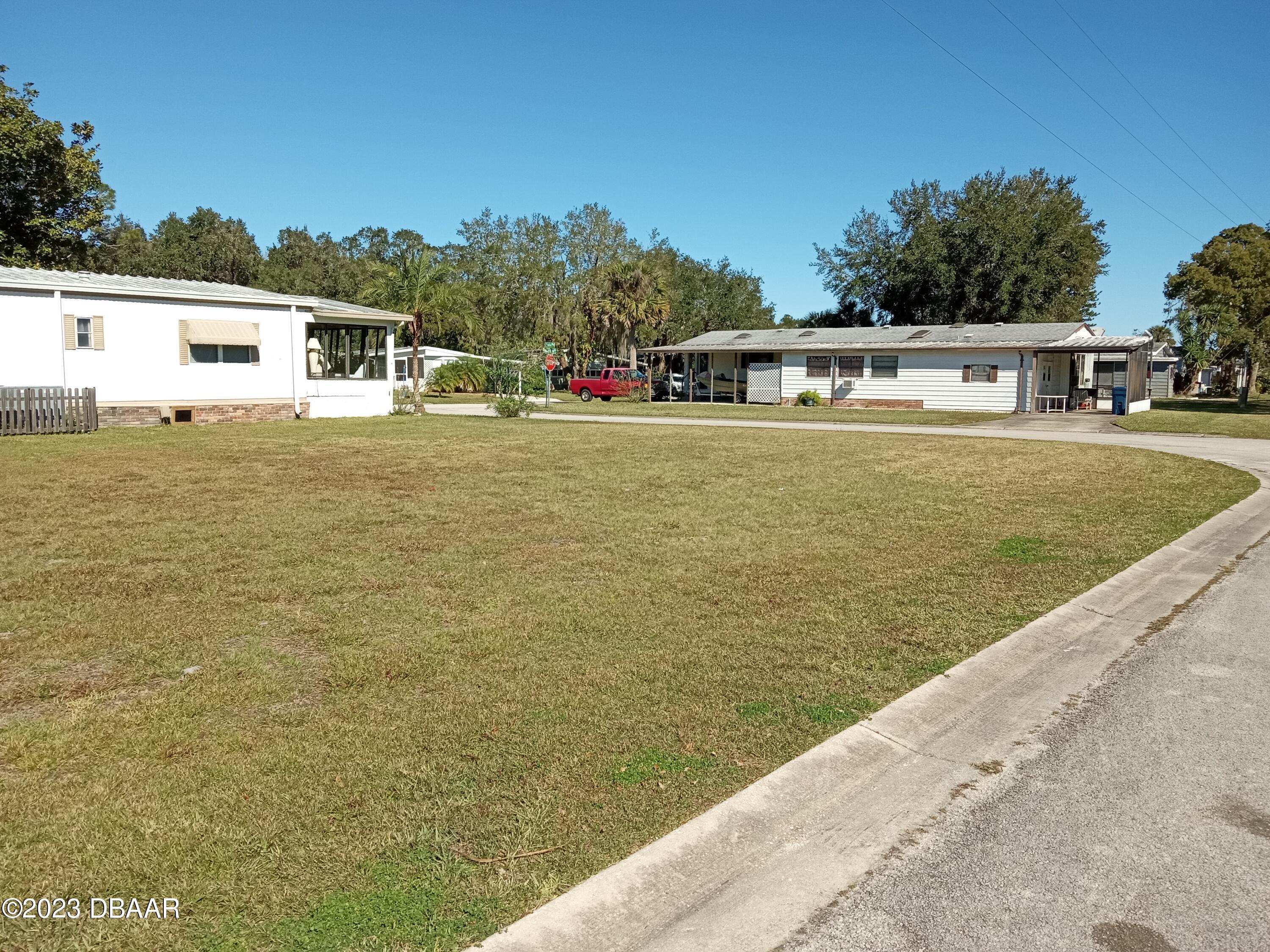 4332 Cedar Way Edgewater, FL 32141 - Photo 7 of 25 a front view of a house with a ocean view