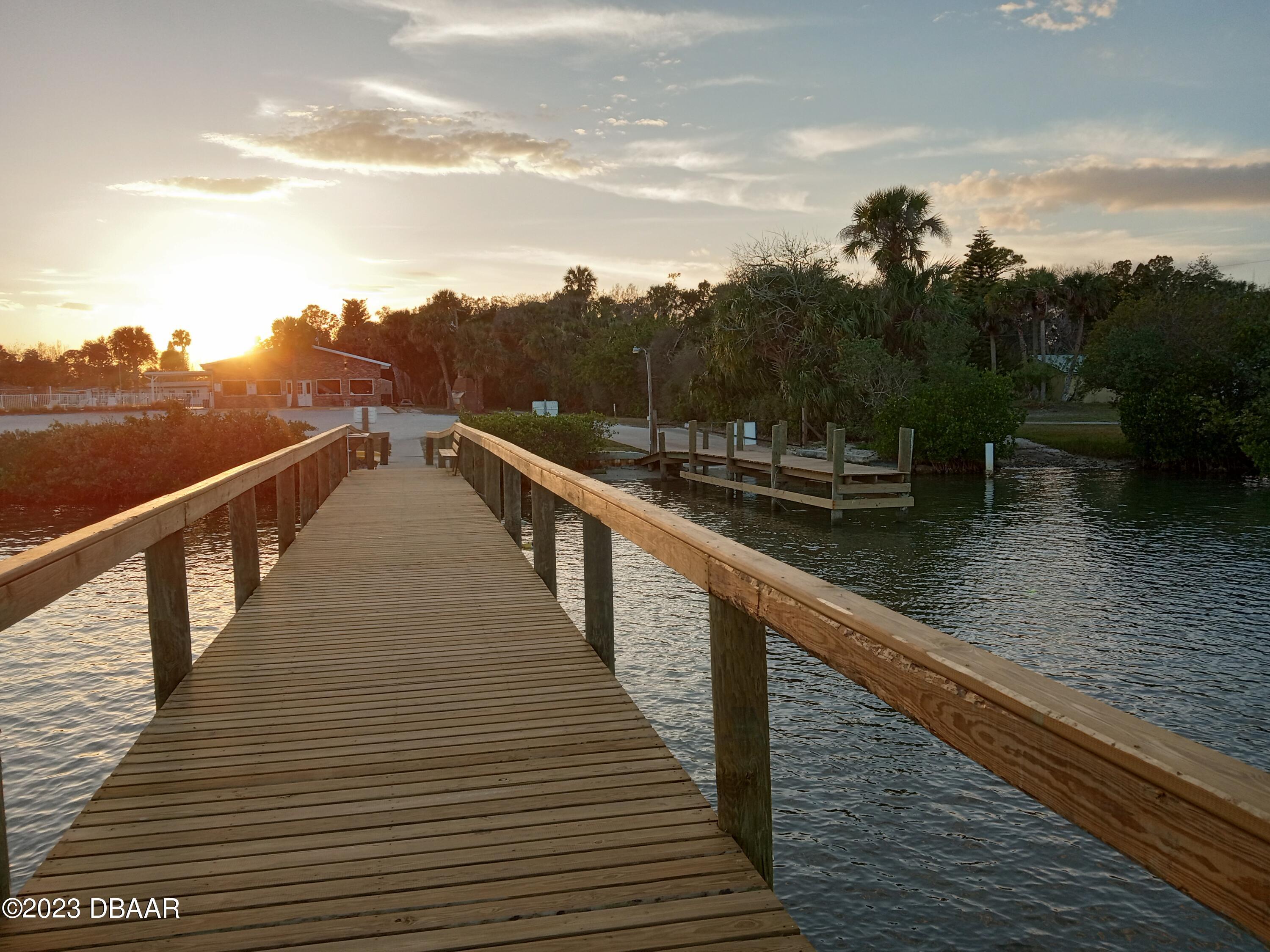 4332 Cedar Way Edgewater, FL 32141 - Photo 8 of 25 a view of balcony and lake