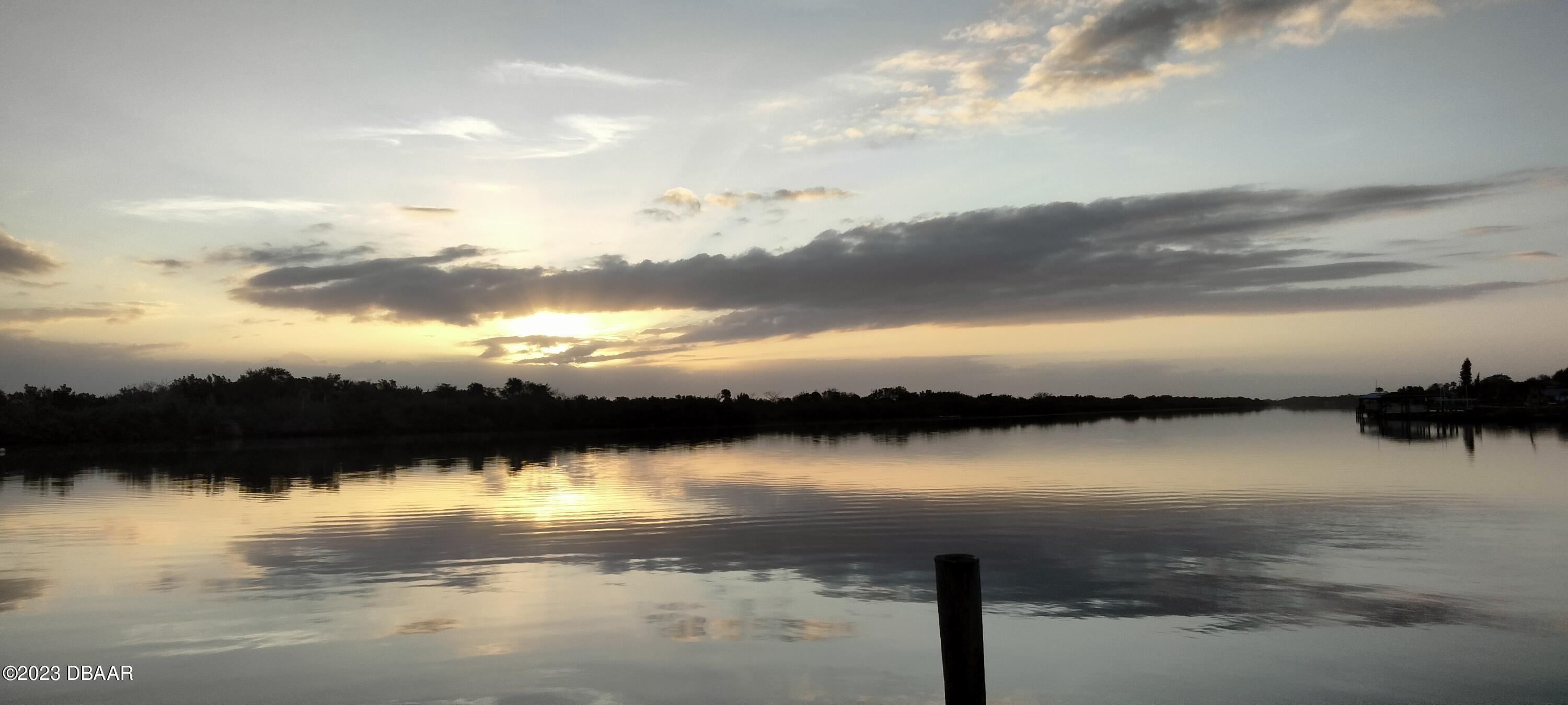 4332 Cedar Way Edgewater, FL 32141 - Photo 9 of 25 a view of outside space and lake