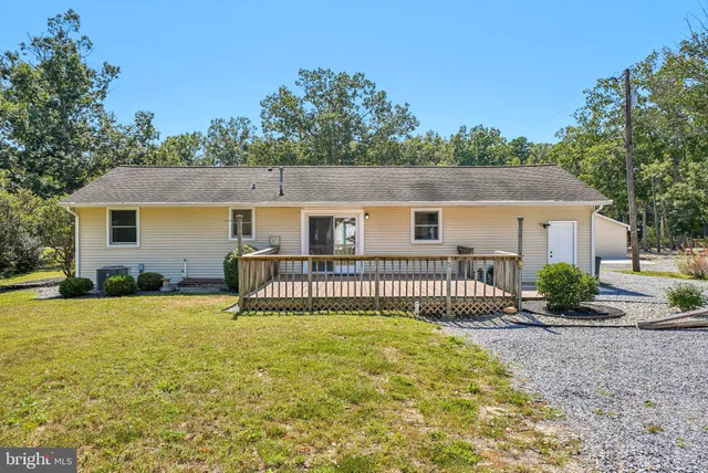 front view of a house with a patio