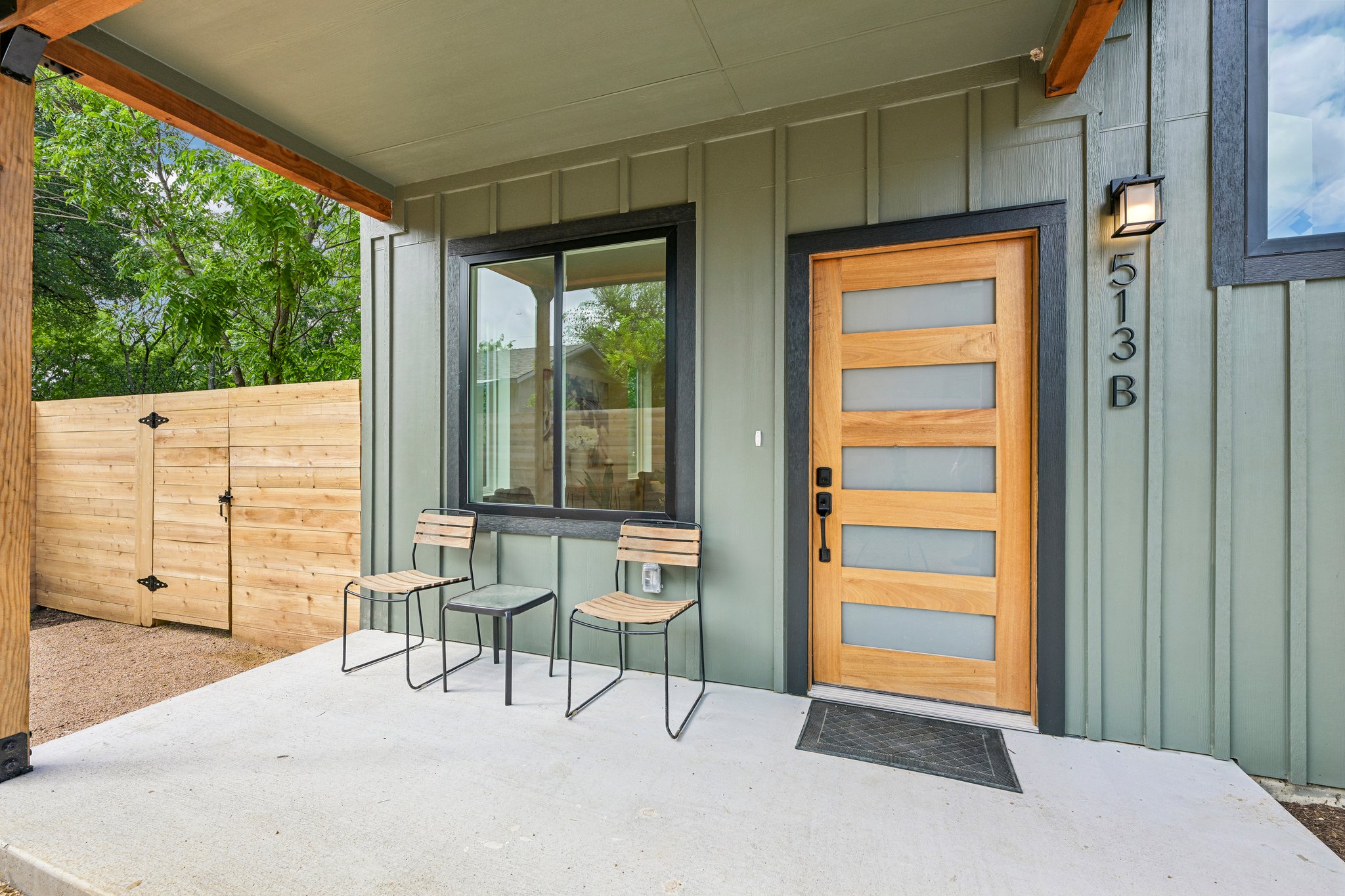 513 West Odell Street, Unit B Austin, TX 78752 - Photo 3 of 38 A covered front patio welcomes you home, perfect for relaxed outdoor living.