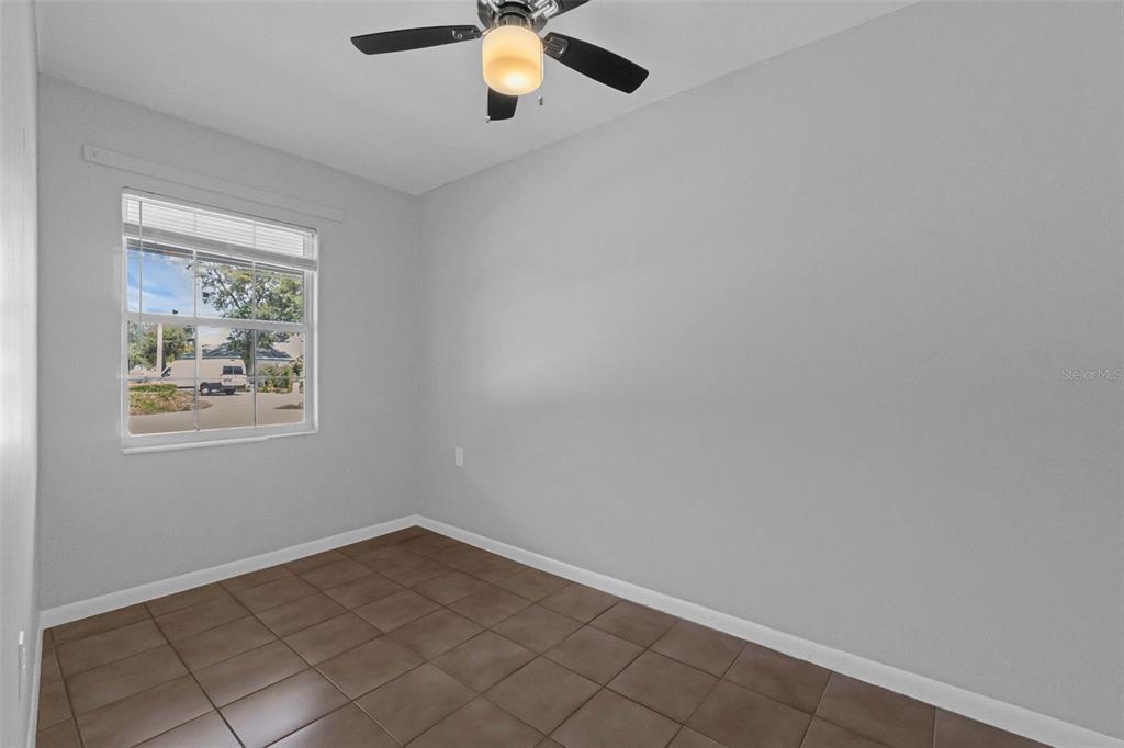 420 Euclid Avenue, Unit 1 Leesburg, FL 34748 - Photo 15 of 18 an empty room with a window