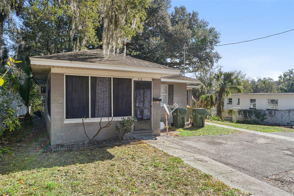 420 Euclid Avenue, Unit 1 Leesburg, FL 34748 - Photo 3 of 18 a view of a house with a patio