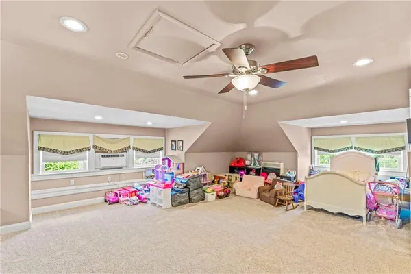 a living room with lots of furniture