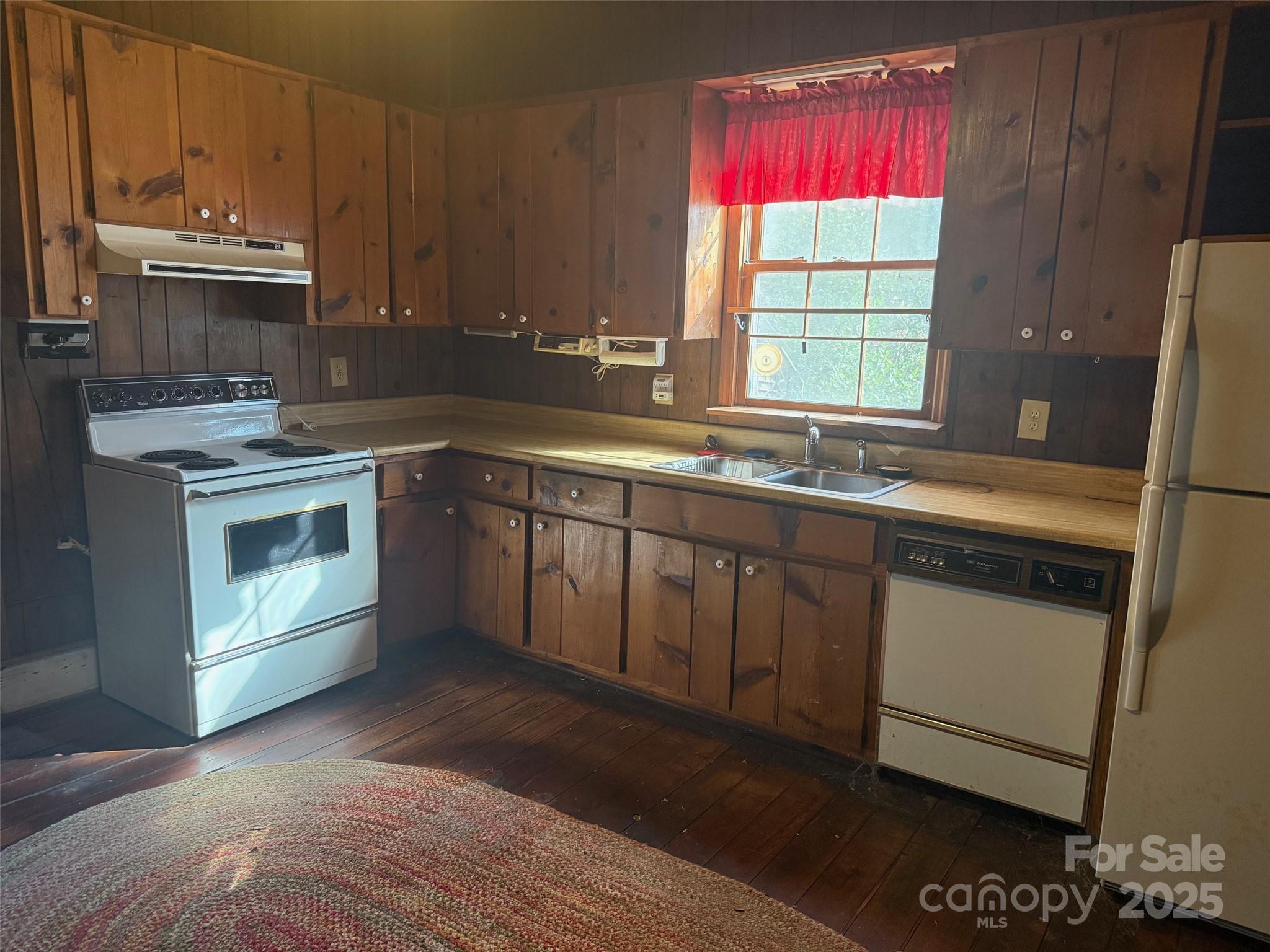 1801 Overbrook Road Kershaw, SC 29067 - Photo 19 of 19 a kitchen with a sink stove and cabinets