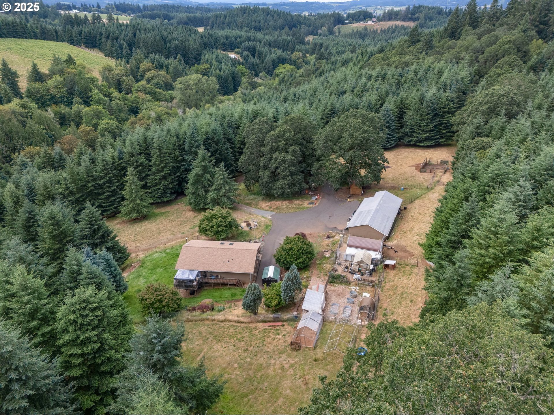 19791 Northeast Sunnycrest Road Newberg, OR 97132 - Photo 30 of 40 an aerial view of a house with a yard and outdoor seating