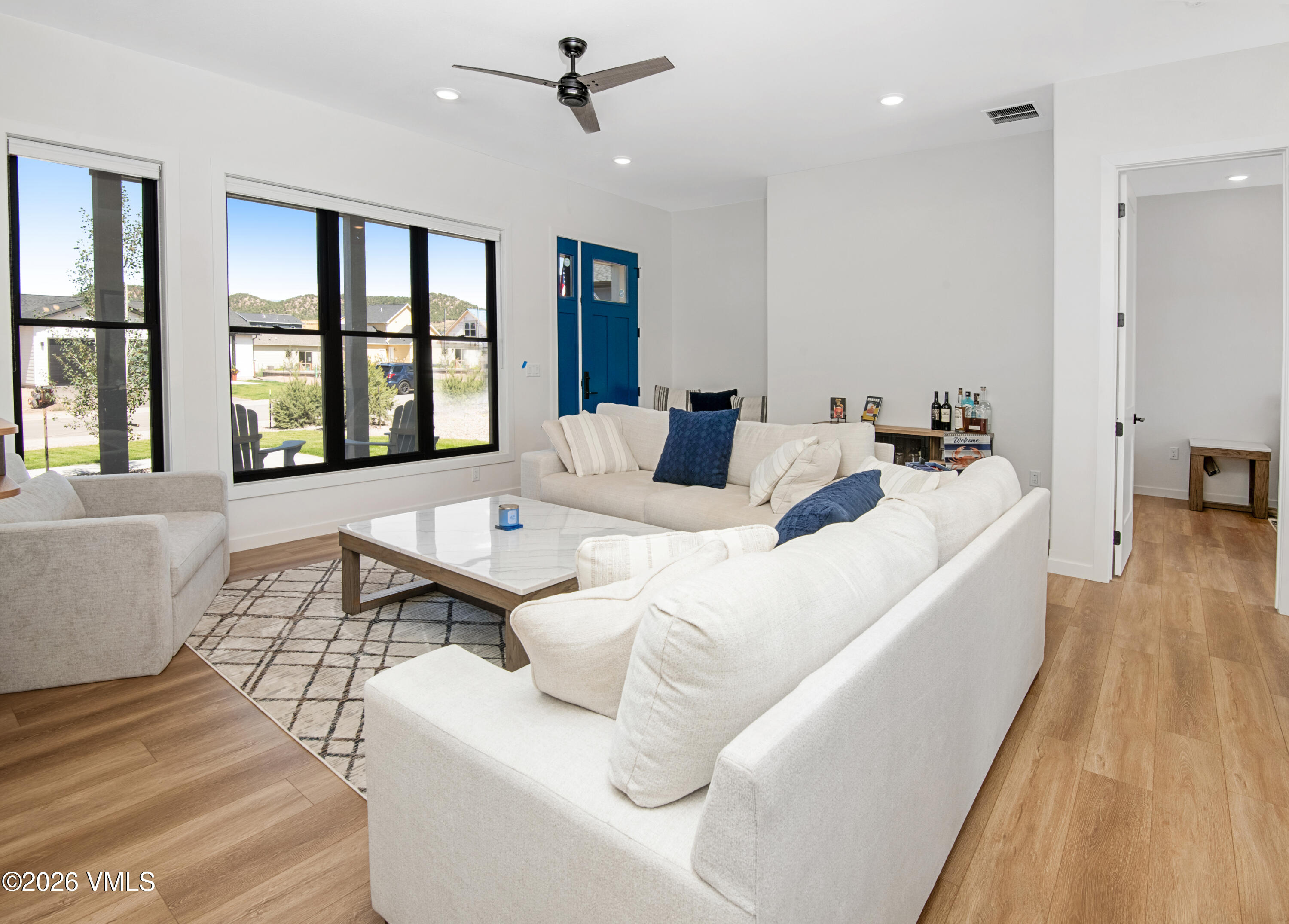 270 Blackhawk Road Gypsum, CO 81637 - Photo 2 of 27 a living room with furniture and large window
