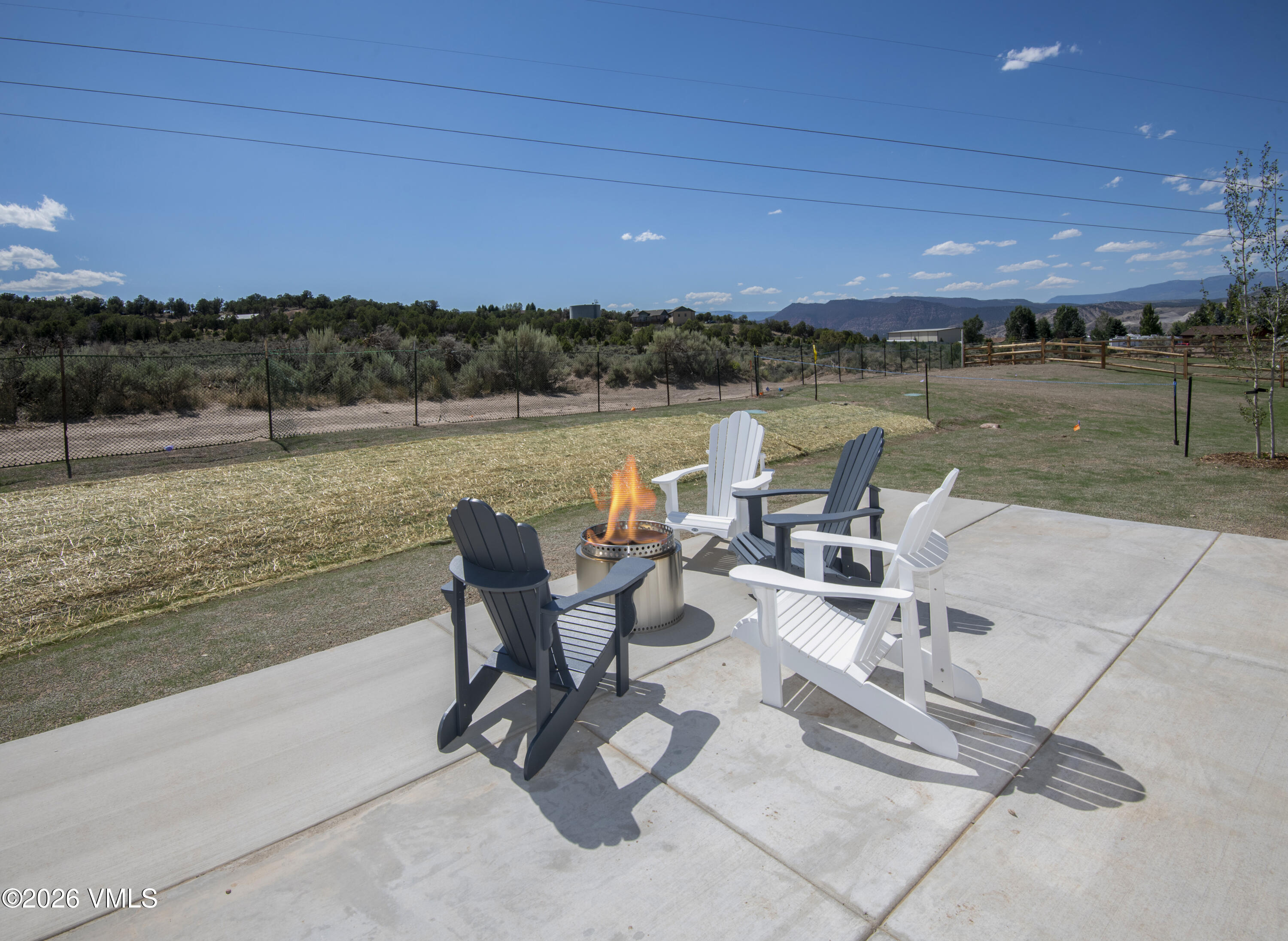 270 Blackhawk Road Gypsum, CO 81637 - Photo 22 of 27 a view of a lake with table and chairs