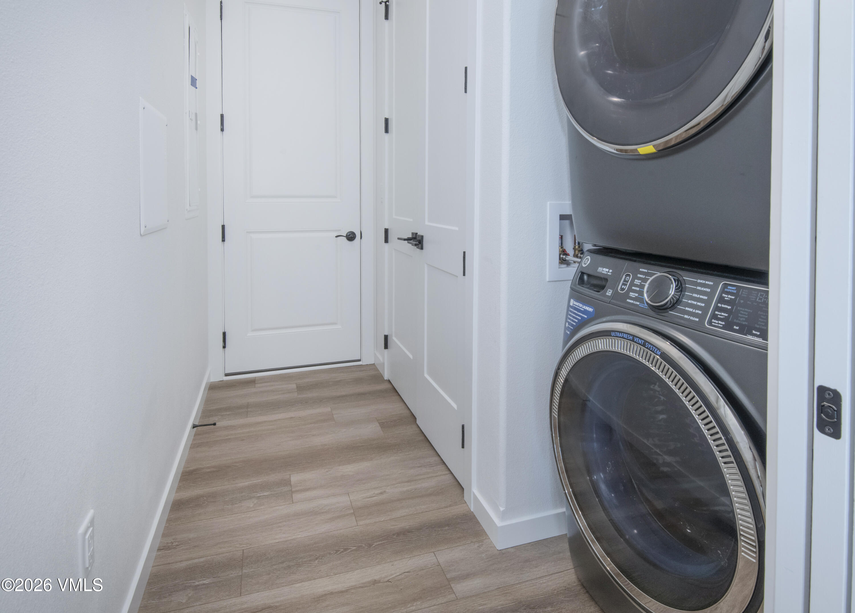 270 Blackhawk Road Gypsum, CO 81637 - Photo 23 of 27 a view of a hallway with washer and dryer