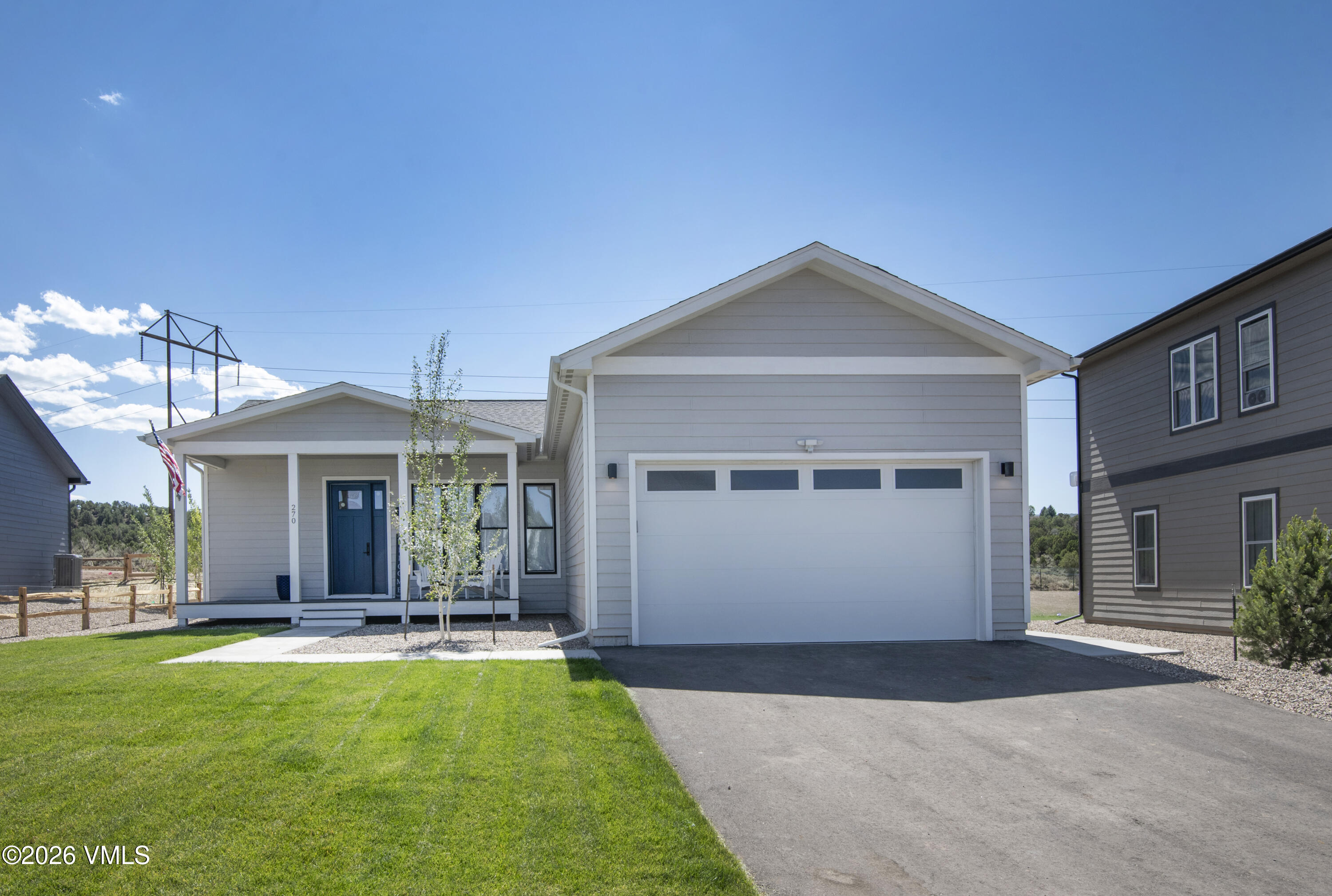 270 Blackhawk Road Gypsum, CO 81637 - Photo 26 of 27 a front view of a house with yard