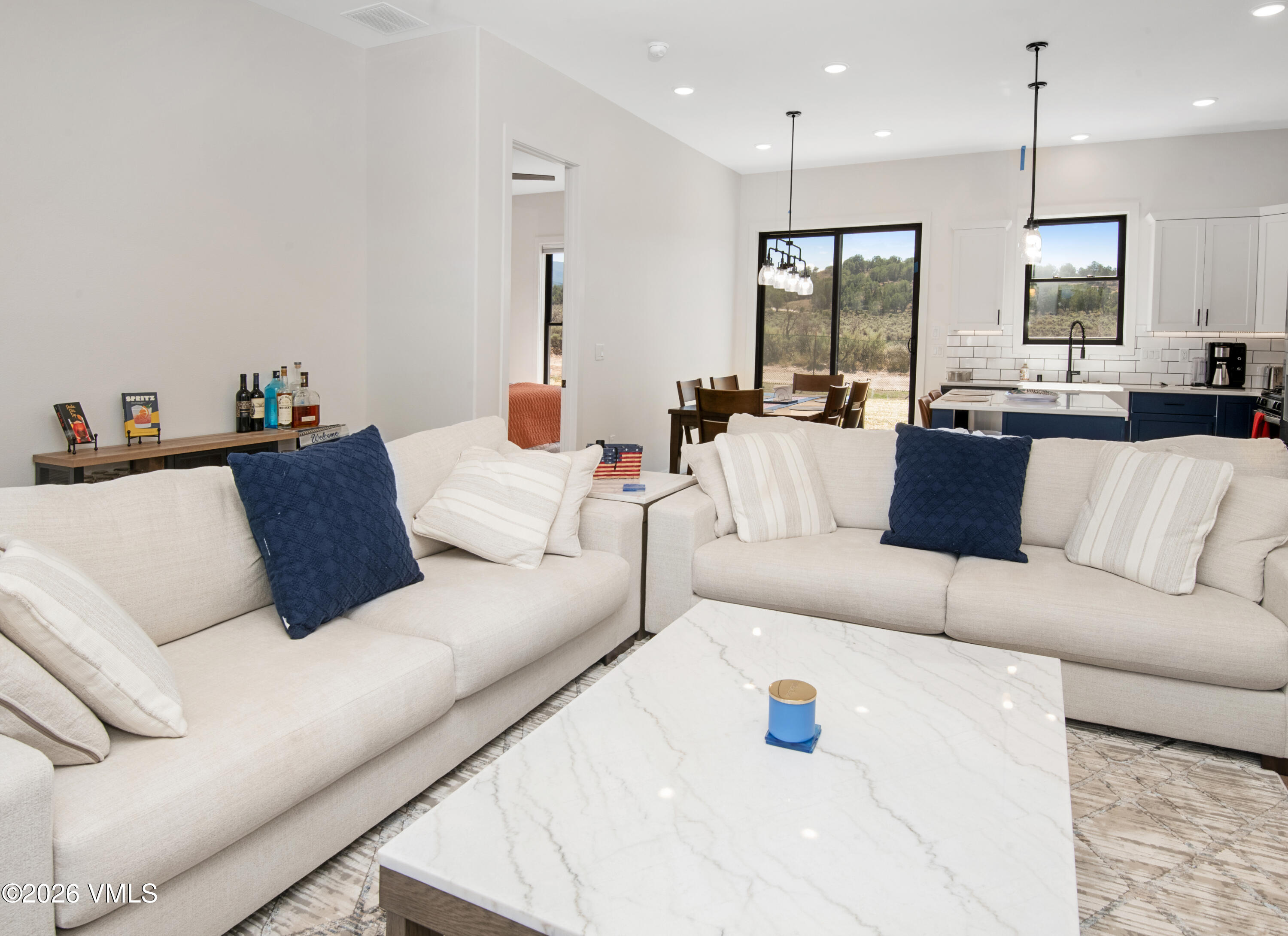 270 Blackhawk Road Gypsum, CO 81637 - Photo 27 of 27 a living room with furniture and a large window
