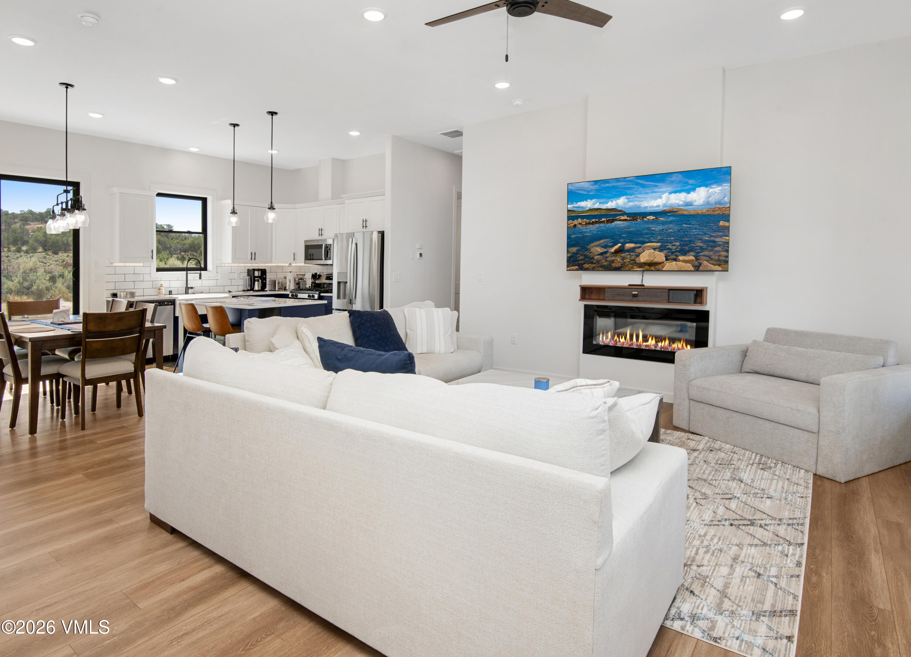 270 Blackhawk Road Gypsum, CO 81637 - Photo 3 of 27 a living room with furniture and a flat screen tv