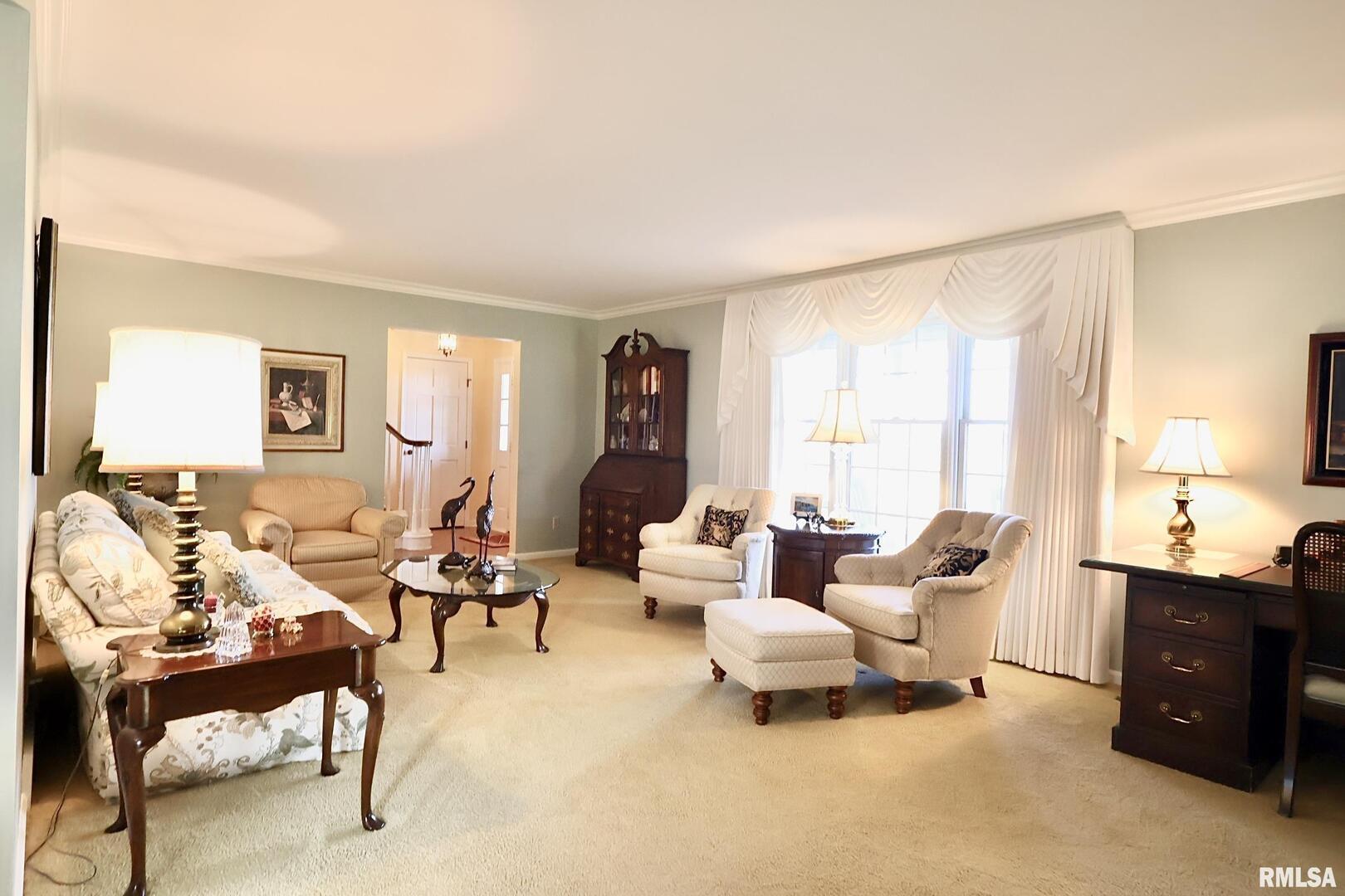 9879 Steel City Road Benton, IL 62812 - Photo 20 of 60 a living room with furniture and a large window