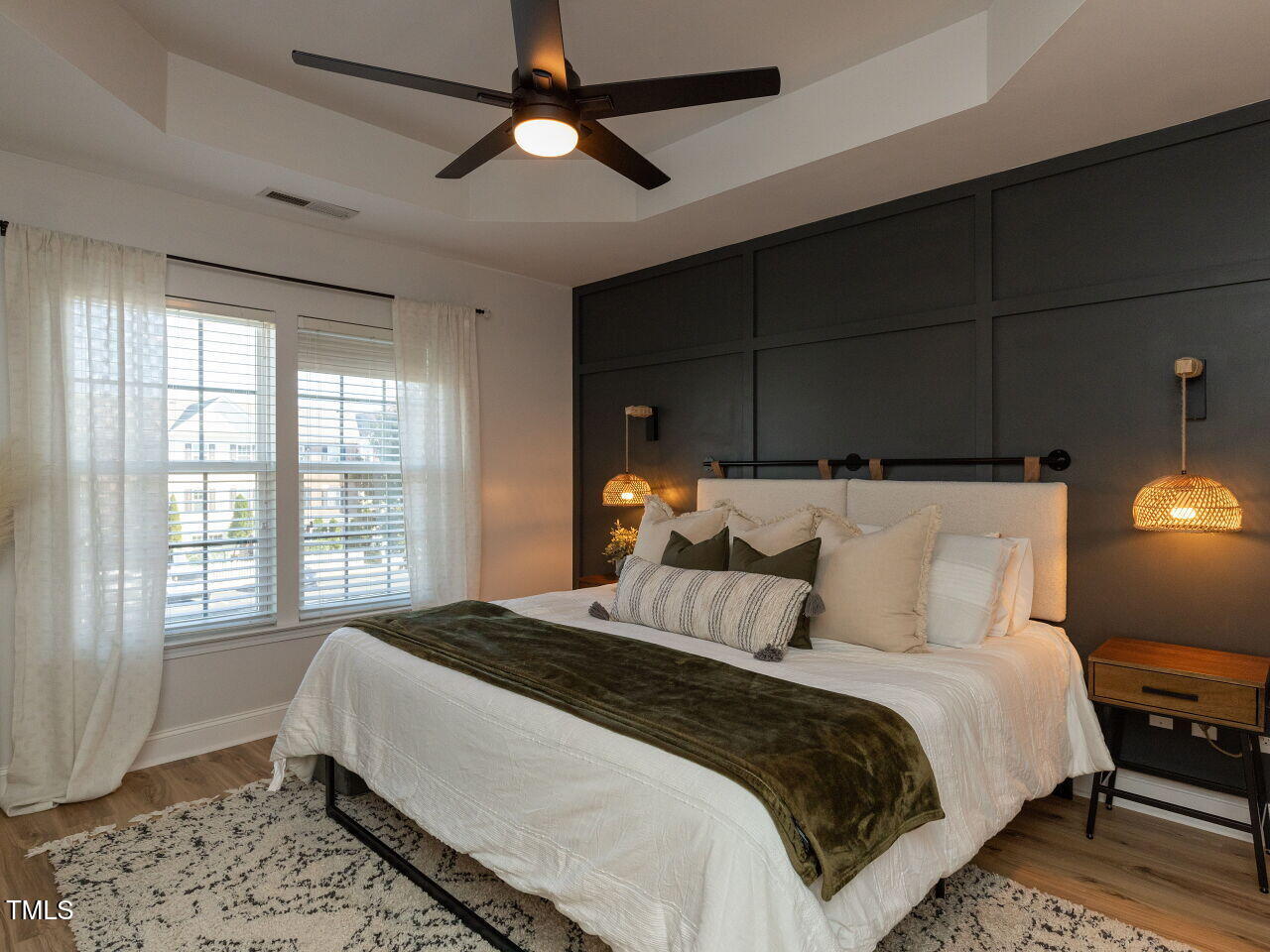1117 Ileagnes Road Raleigh, NC 27603 - Photo 11 of 27 a bedroom with a large bed and a window