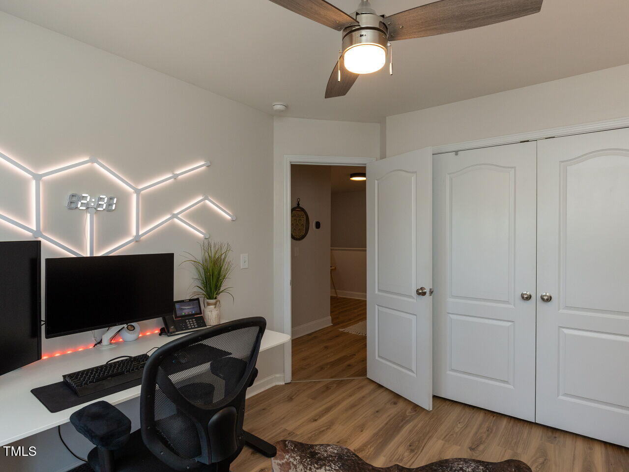 1117 Ileagnes Road Raleigh, NC 27603 - Photo 21 of 27 a bedroom with a workspace