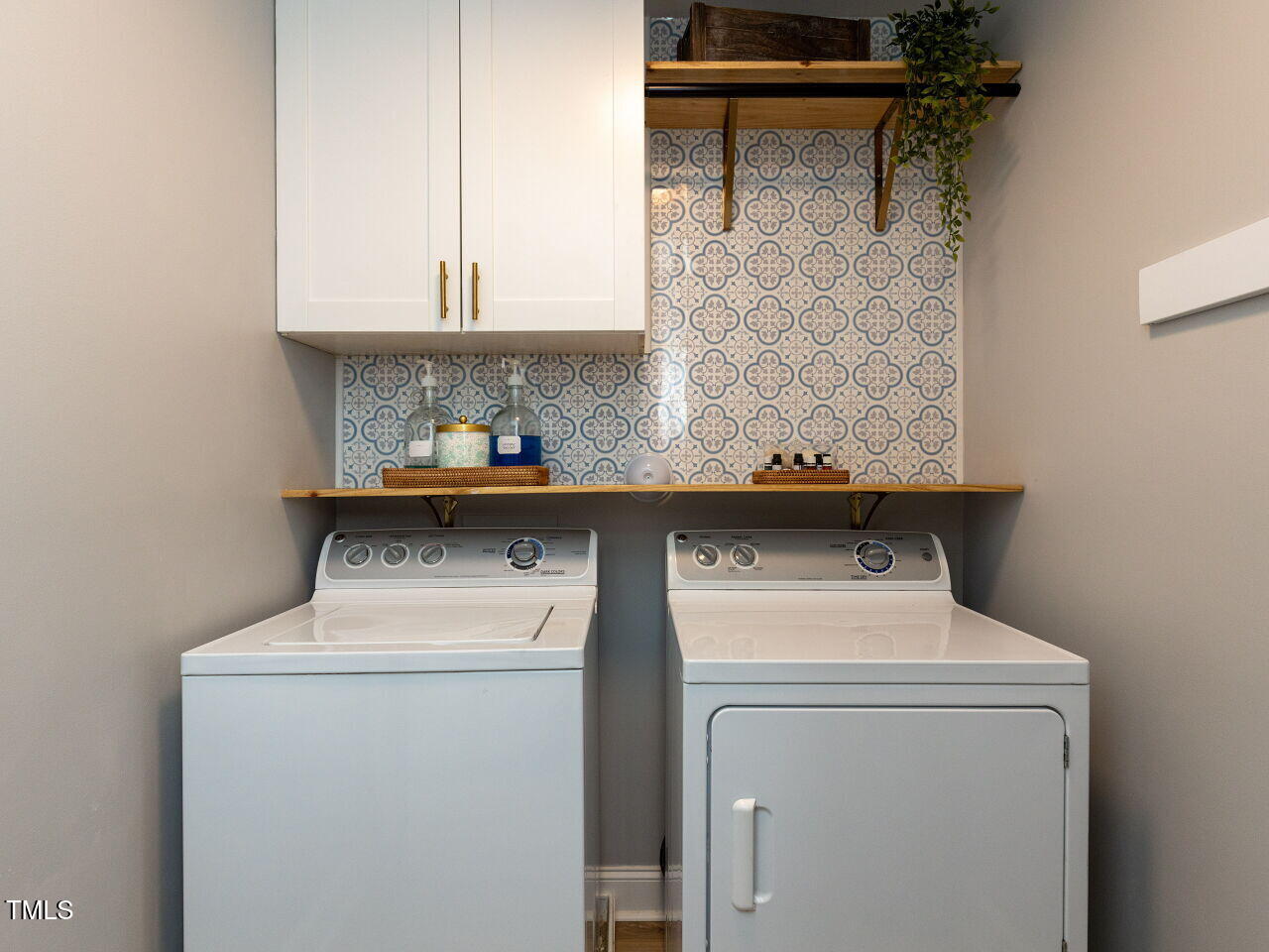 1117 Ileagnes Road Raleigh, NC 27603 - Photo 23 of 27 a utility room with dryer and washer