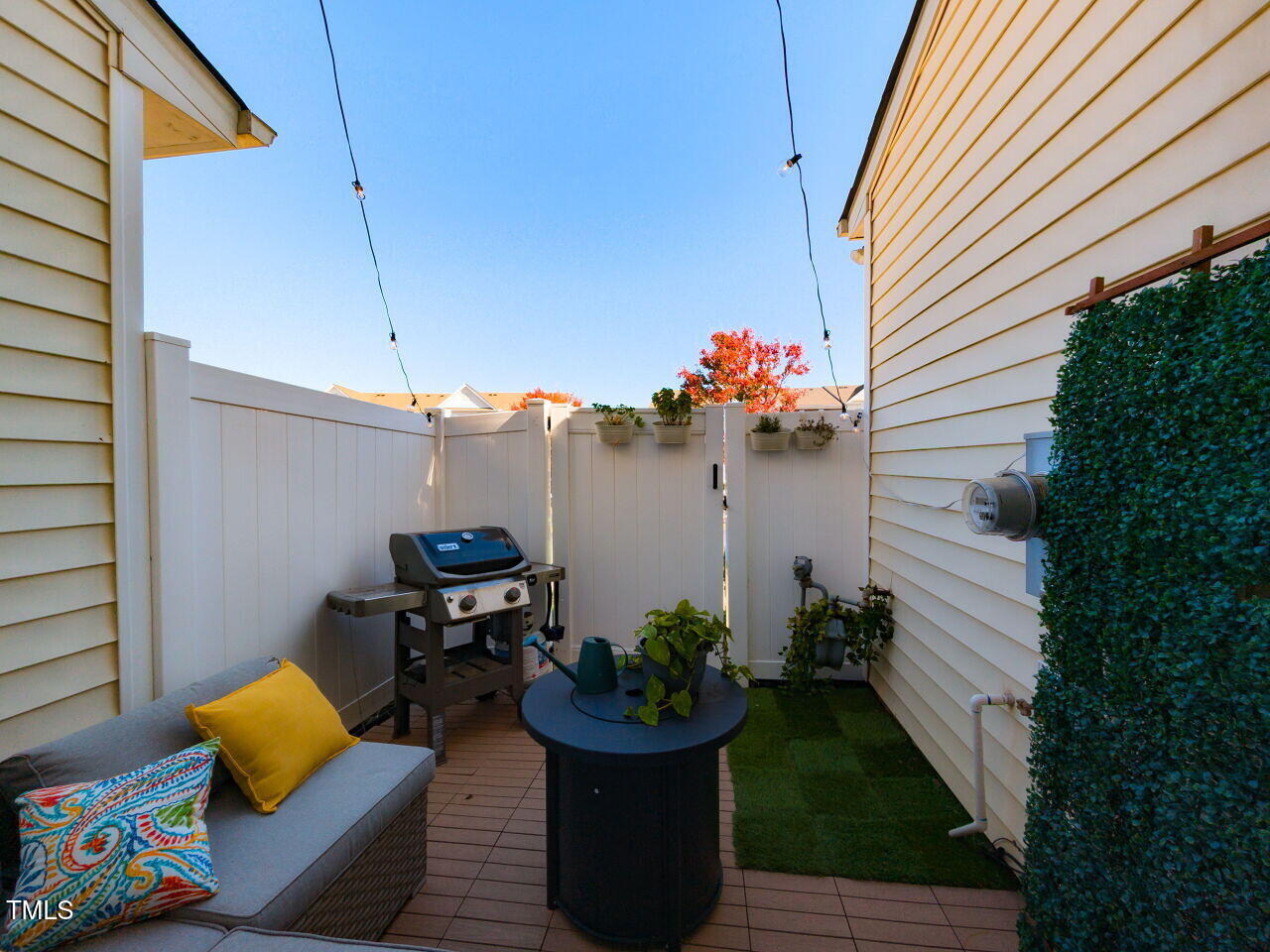 1117 Ileagnes Road Raleigh, NC 27603 - Photo 24 of 27 a view of a chairs and table in patio