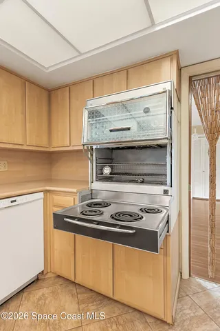 an aerial view of a house with yard swimming pool and outdoor seating