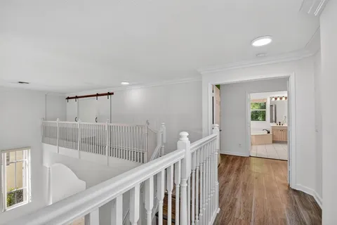 a view of a big room with wooden floor
