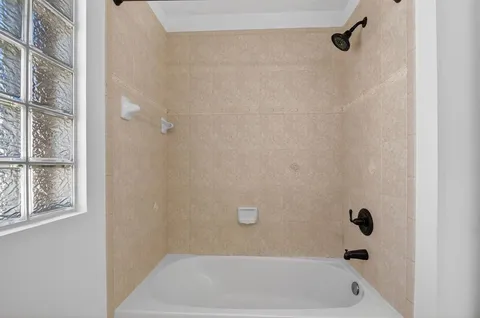 a view of a lake with a building in the background