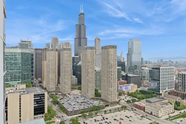 a view of a city with tall buildings